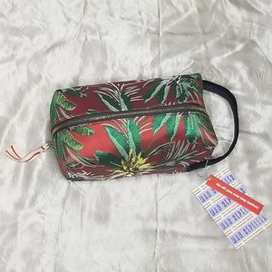 The Carry Bradshaw Cosmetic Bag by Man Repeller